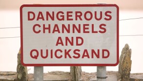 danger quicksnads sign on the Leven estuary near newby Bridge