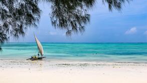 Stunning white sand beach of BlueBay Beach resort & Spa, Zanzibar, Tanzania, Africa - idyllic and deserted.