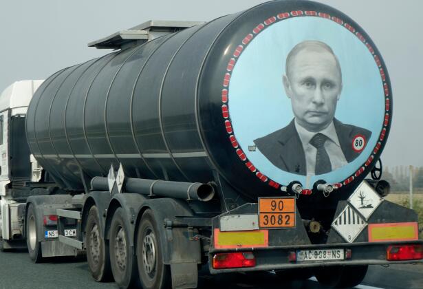 A large tank truck (Serbian licence plate) with image of Vladimir Putin on its rear, drives along the high way through Croatia.