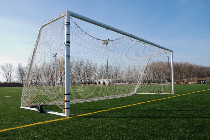 Wheeled mobile goalposts and net on a soccer pitch in Toronto Ontario Canada