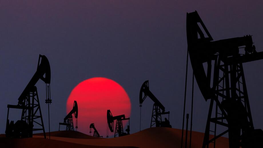 Oil pumps silhouette at  sunset