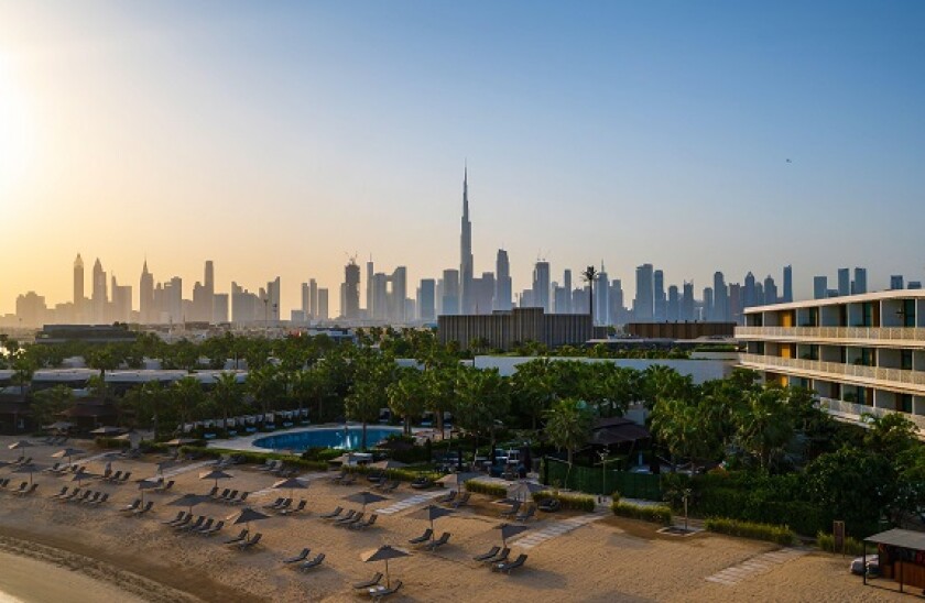 Dubai skyline of the downtown skyscrapers seen from the coast. Panoramic view of downtown Dubai filled with modern skyscrapers in the United Arab Emir