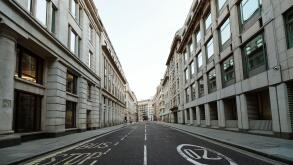 Low angle street shot of the deserted Moorgate on day 7 of the lockdown. The City of London, Mar 2020