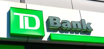 TD Bank sign, logo on bank branch. TD Bank, N.A., is an American national bank and subsidiary of the Canadian multinational Toronto-Dominion Bank - Ne