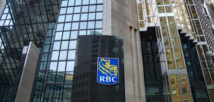 TORONTO - OCTOBER 2019:  The logo of RBC, Canada's largest banking company, on its modern head office building in Toronto's financial district.