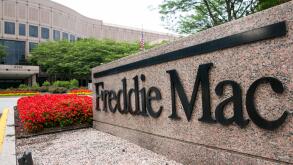 A logo sign outside of the headquarters of the Federal Home Loan Mortgage Corporation (FHLMC), known as Freddie Mac, in Tysons C