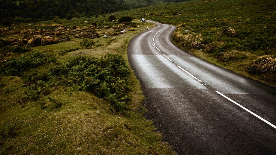 Empty country road through moorland.