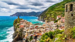 Beautiful view of Vernazza, one of the five famous fisherman villages of Cinque Terre with dramatic cloudscape in Liguria, Italy