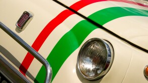 Headlight and badge of Fiat 500 with Italian stripes