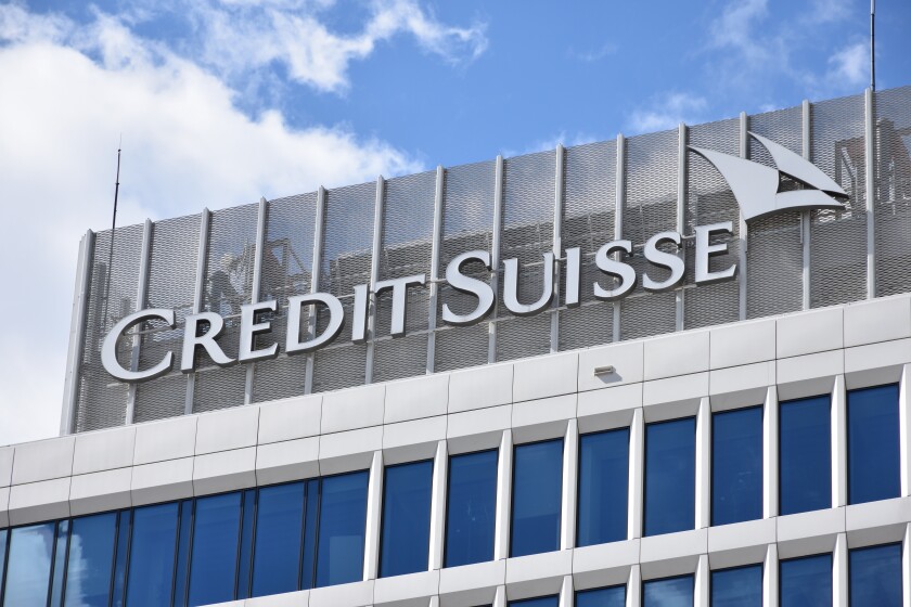 Credit Suisse signage, logo, symbol on the facade of Credit Suis