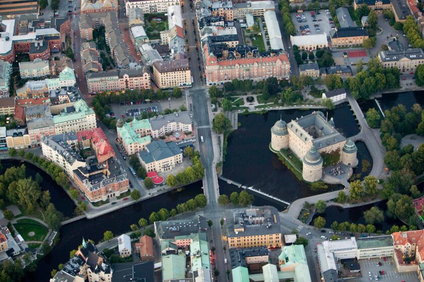 A castle in a town, Orebro, Narke, Sweden.