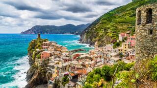 Beautiful view of Vernazza, one of the five famous fisherman villages of Cinque Terre with dramatic cloudscape in Liguria, Italy