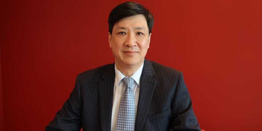 Lee Kwan as Chief Network Officer.jpg