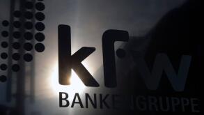The sun is reflected in the logo of the state development KfW bank in Berlin September 17, 2008. Germany's Finance Ministry wants an explanation as to why state lender KfW transferred 300 million euros ($426 million) to Lehman Brothers on the day the U.S.