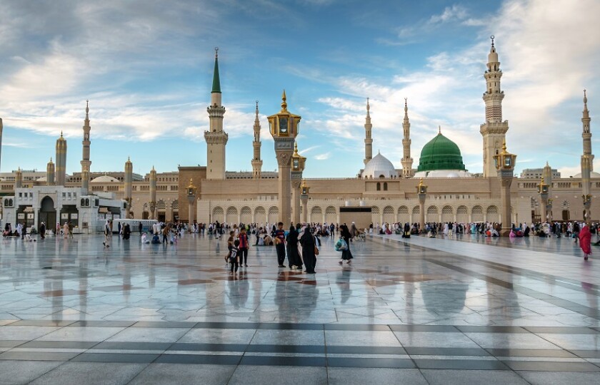 Muslims gathered for worship Nabawi Mosque, Medina, Saudi Arabia