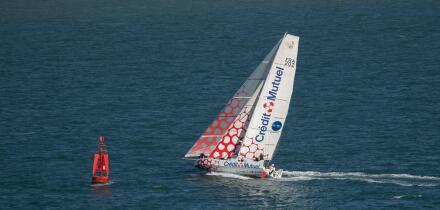 Barcelona, Catalonia, Spain, September 10 2025 ,Sailing Yacht With Credit Mutuel Sails Near Red Buoy On Open Ocean Adventure During Race