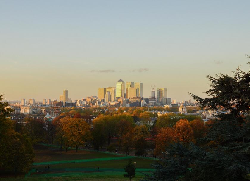 Sunset view of the City of London, Canary Wharf, taken from Greenwich Park