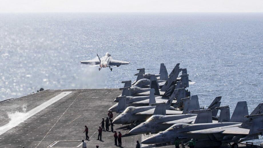 MIDDLE EAST, MARCH 3, 2026:  An F/A-18 Super Hornet launches from the flight deck of the USS Abraham Lincoln in support of Operation Epic Fury in the U.S. Central Command area of responsibility, March 3, 2026.