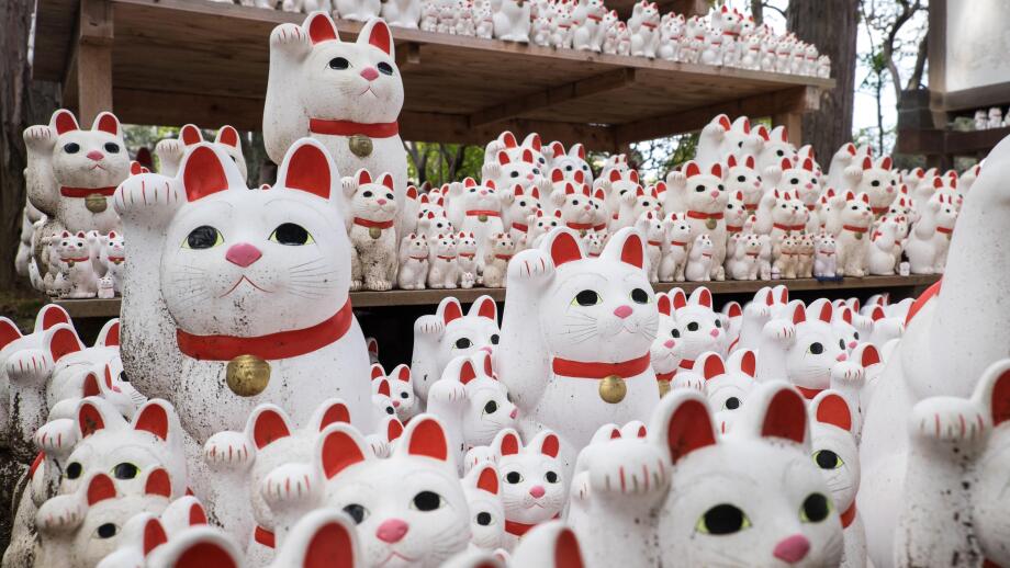 Japan, Tokyo, Honshu Island: Maneki neko at Gotoku-ji, a temple dedicated to the "maneki neko" lucky beckoning cats, in the district of Setagaya. A co
