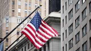 Wall street American flag in the Financial District of Lower Manhattan