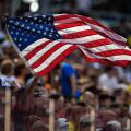 A football fan waves a U.S. flag in the Group F match between Sweden and South Korea during the FIFA World Cup 2018 in Nizhny Novgorod, Russia, 18 Jun