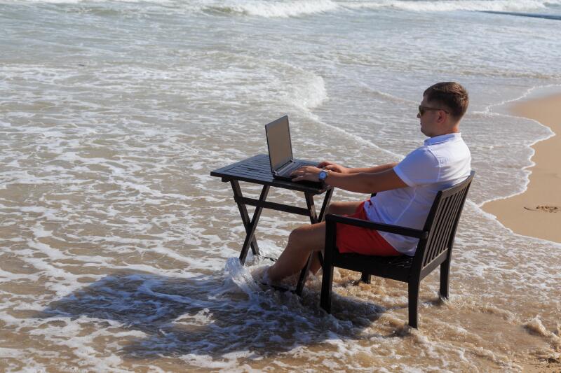 Business Man Working on Tropical Beach