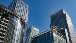 04.04.2023. London, UK. City bank and HSBC skycrapers in Canary Wharf financial district. An investment banks and financial services companies.