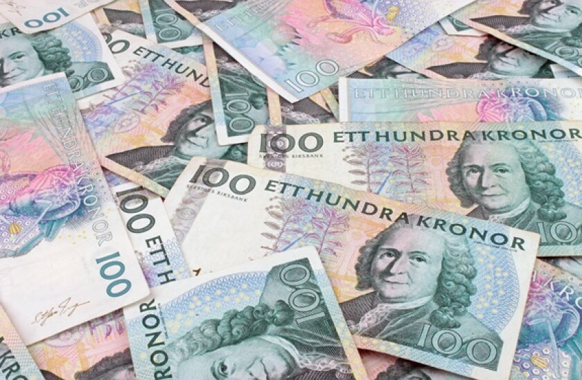 A background of scattered Swedish, 100 Kroner currency notes.