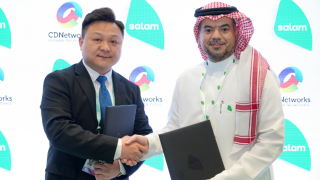 From left: Antony Li, head of APAC Sales at CDNetworks shakes hands with Abdullah Alrufaidi, wholesale sales director at Salam