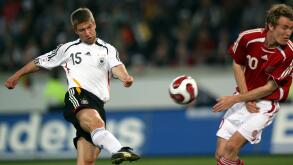 German international Thomas Hitzlsperger (L) fires off a shot during the test cap Germany v Denmark at the MSV Arena stadium of Duisburg, Germany, Wednesday, 28 March 2007. Photo: Franz-Peter Tschauner