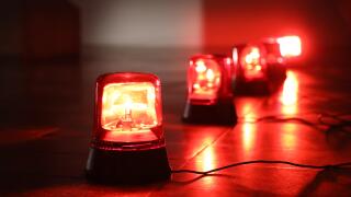 Background with big red flashing alarm lights.