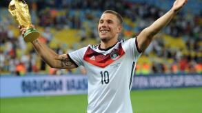 Lukas Podolski of Germany celebrates with the trophy following the 2014 FIFA World Cup Final at the Estadio do Maracana in Rio de Janeiro, Brazil on July 13, 2014. UPI/Chris Brunskill