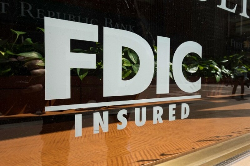 FDIC insured sign on bank from Alamy 15Mar23 575x375