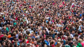 Crowd, many people in confined space, at a festival,