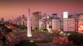Avenida 9 de Julio at dusk in Buenos Aires with Obelisk and traffic