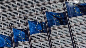 Flags of European Union weaving outside the European Commission building, Brussels, Belgium