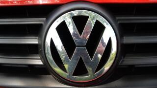 VW Logo on a red Volkswagen car