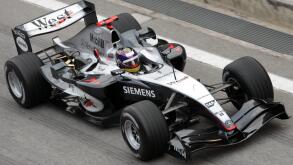 (dpa) - Columbian Formula 1 driver Juan Pablo Montoya drives in a McLaren-Mercedes race car at the Circuit de Catalunya race course in Barcelona, Spain, 25 November 2004. Montoya, who is still under contract with the BMW-Williams team, received permission