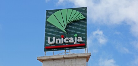 Sign over Unicaja bank, Torremolinos, Spain