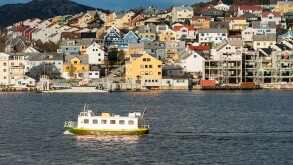 Norwegian town Kristiansand with local ferry boat