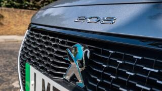 London- July 2022: Peugeot e 208 electric and hybrid model from French car manufacturer.