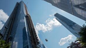 Residential and commercial skyscrapers under construction near the Hudson Yards subway on the west side of Manhattan, New York City.
