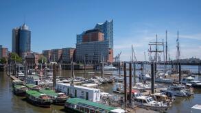 Elbphilharmonie Hamburg in sunshine, with ships and harbor in the foreground, Germany