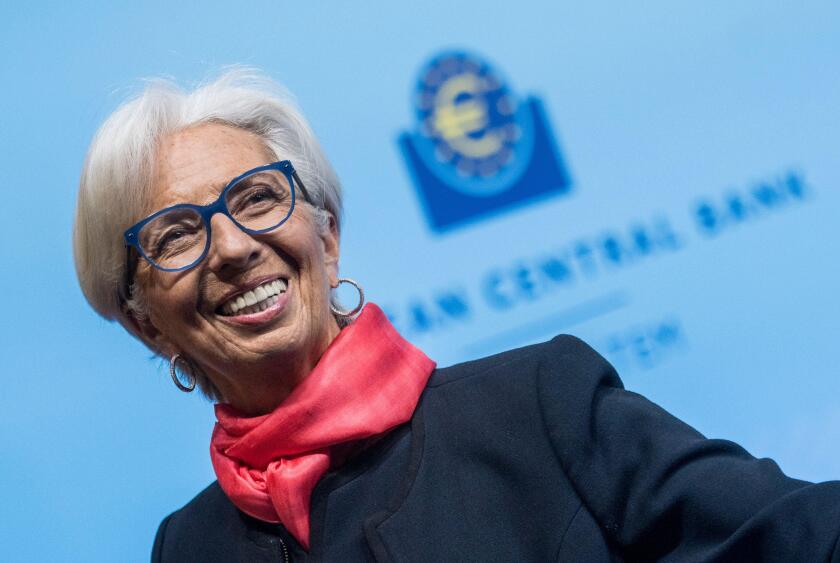 16 December 2021, Hessen, Frankfurt/Main: Christine Lagarde, President of the European Central Bank (ECB), leaves a press conference after a Governing Council meeting on monetary policy in the eurozone. Photo: Thomas Lohnes/AFP Pool/dpa
