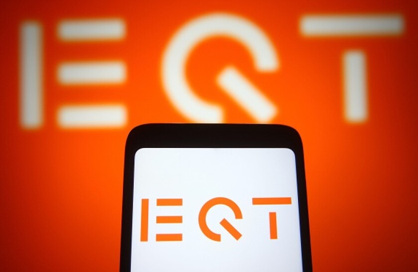 In this photo illustration an EQT (EQT Partners AB) logo of a Swedish private equity firm is seen on a smartphone and a pc screen. (Photo by Pavlo Gonchar / SOPA Images/Sipa USA)