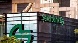 Close up of the logo and banner of public owned enterprise Sekerbank at Istanbul headquarters in Levent, Istanbul, Turkey.