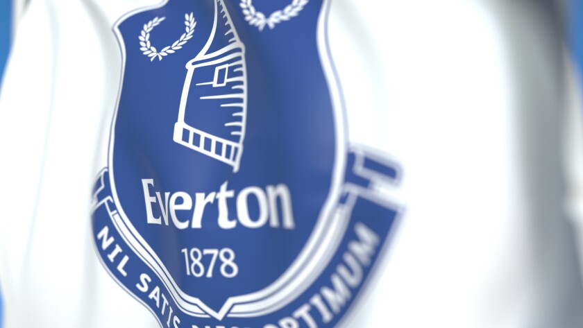 Flying flag with Everton FC football club logo, close-up. Editorial 3D rendering