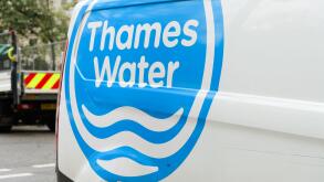 London, UK - March 16, 2023; Blue and white Thames Water logo on side of van