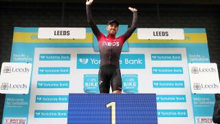 Team Ineos' Chris Lawless takes the podium after winning overall during stage four of the Tour de Yorkshire.