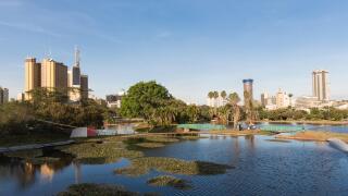 View of lake in front of Nairobi skyline, Kenya